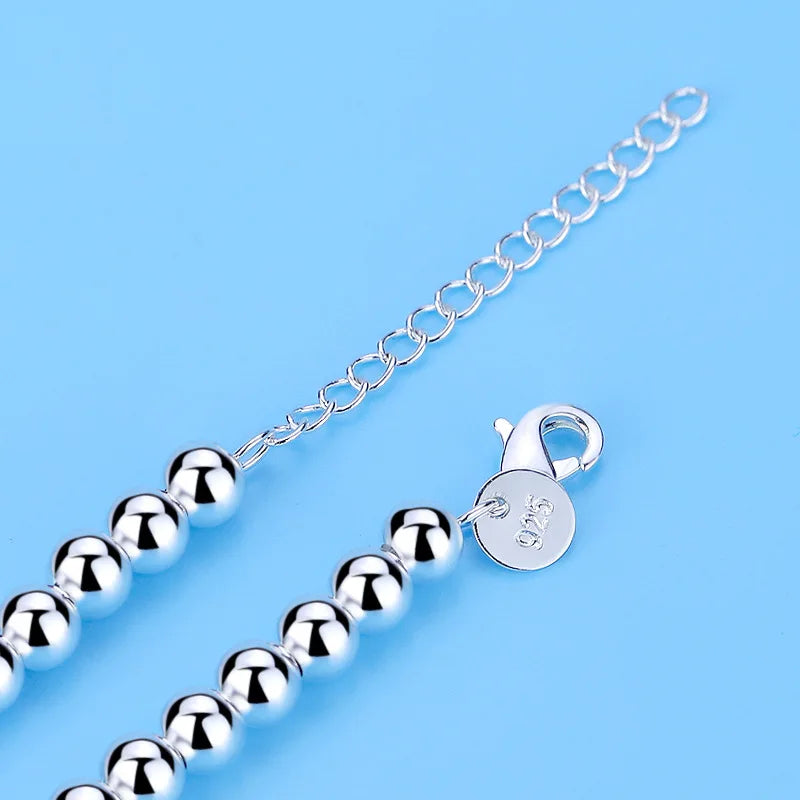 Party-Ready Heart Pendant Bracelet | Chic Sterling Silver Design