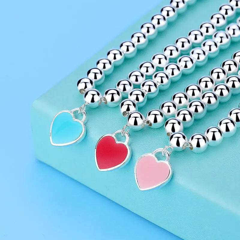 Party-Ready Heart Pendant Bracelet | Chic Sterling Silver Design